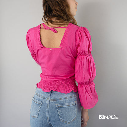 Blusa, con detalle en la espalda